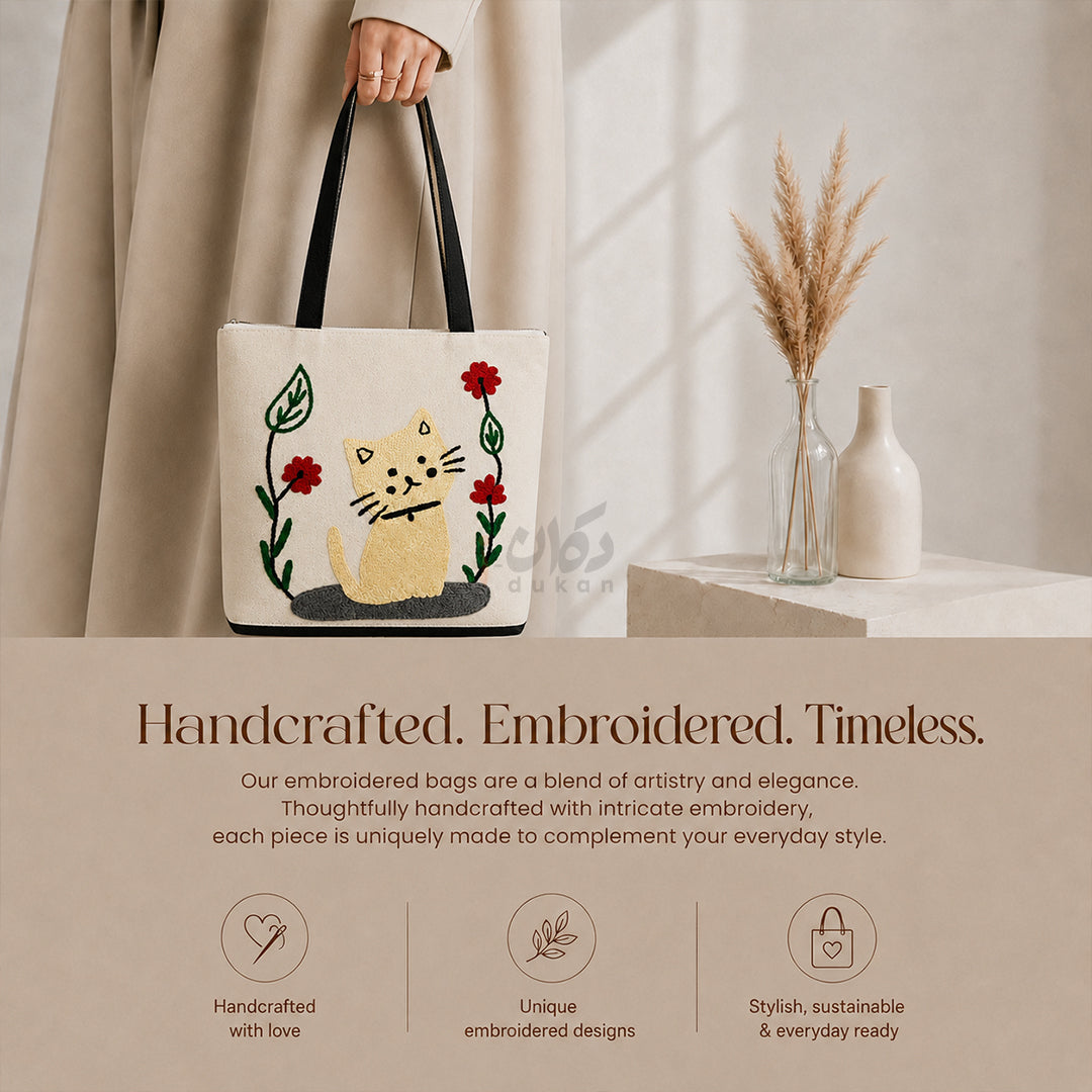 Handcrafted embroidered tote bag features infographic