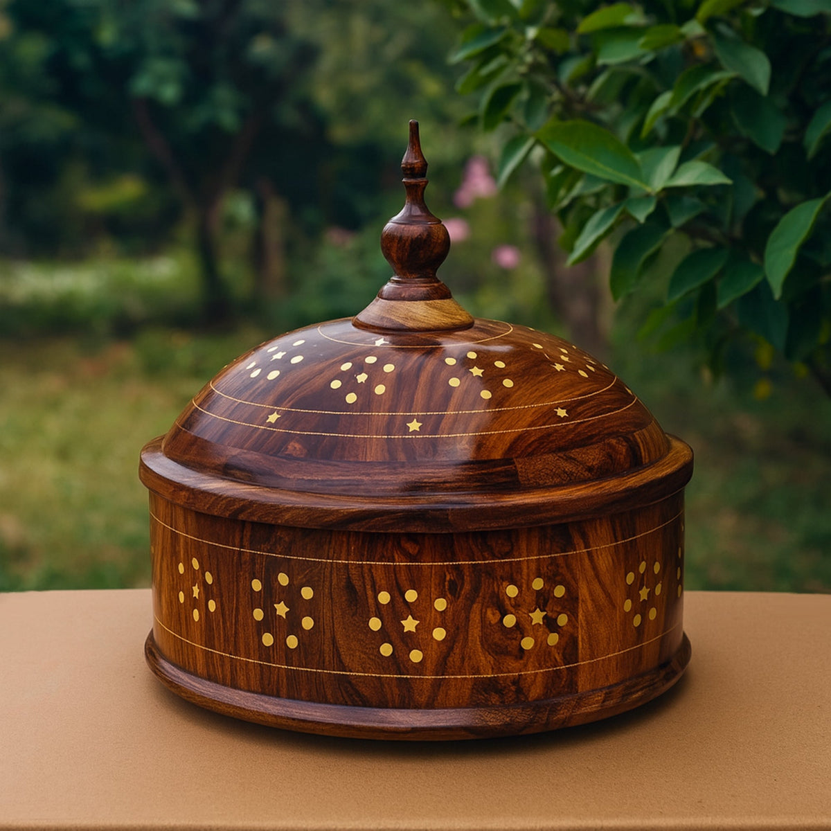 Handcrafted brass work hotpot outdoors on table