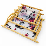 Floral acrylic wooden serving trays stacked