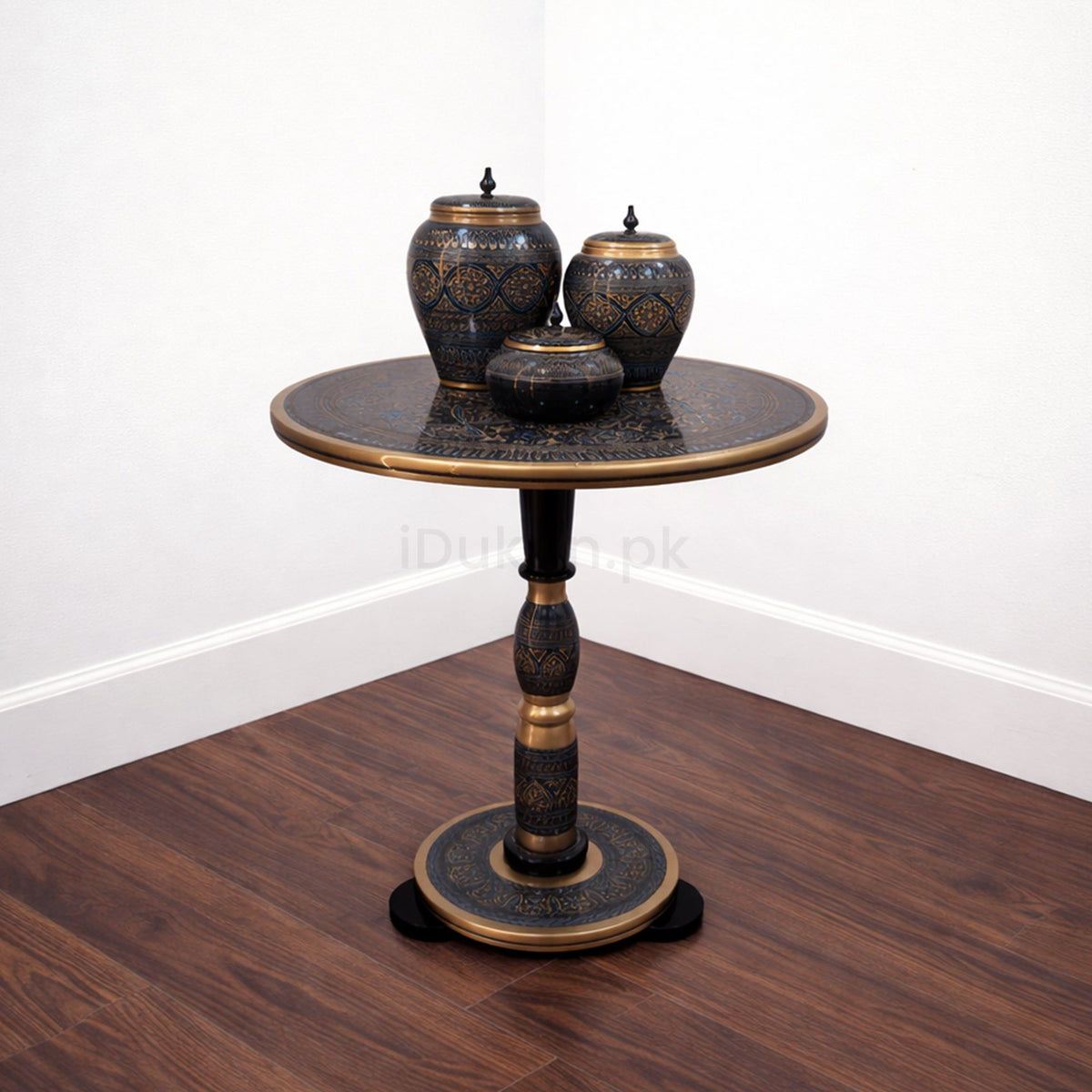 Black hand painted coffee table on wooden floor