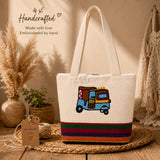 Rickshaw art embroidered cotton canvas bag on wooden stand