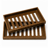 Stacked wooden catchall trays close up