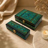 Green handcrafted wooden jewelry box set of 2 on table