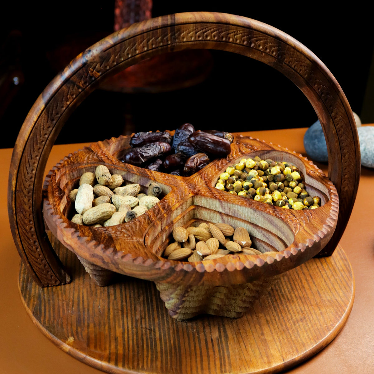 Foldable wooden basket filled with dry fruits and nuts