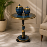 Golden blue naqashi side table with jars in living room