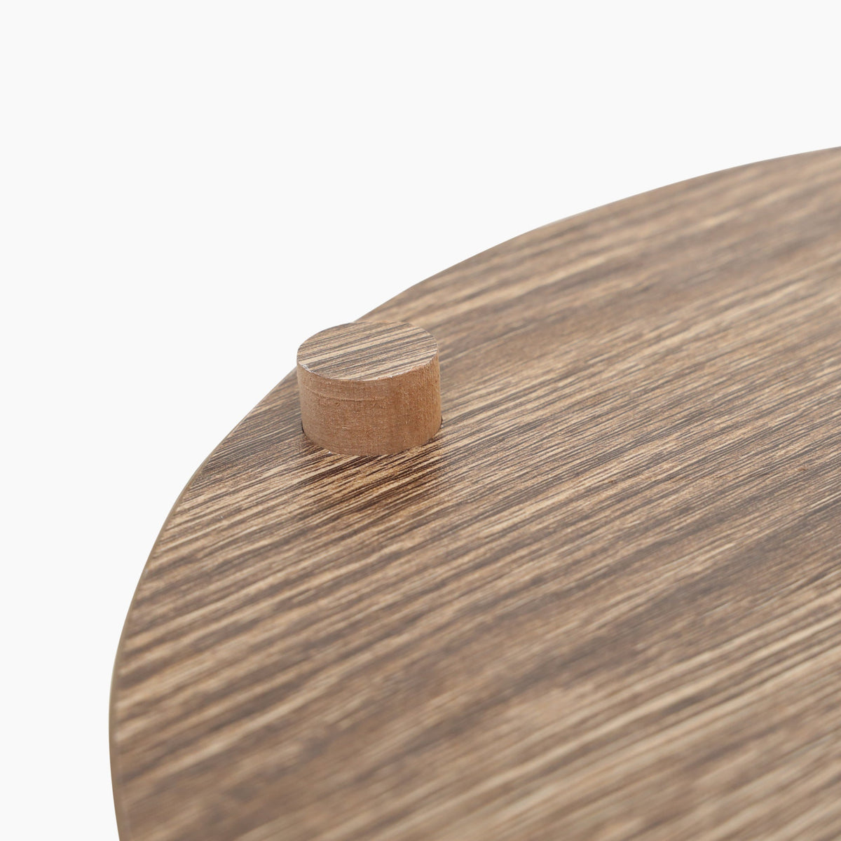 Close up of wooden top on nesting basket table