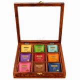 Wooden masala box with colorful spices inside